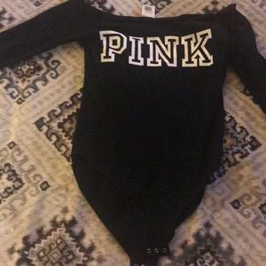 A black and white body suit